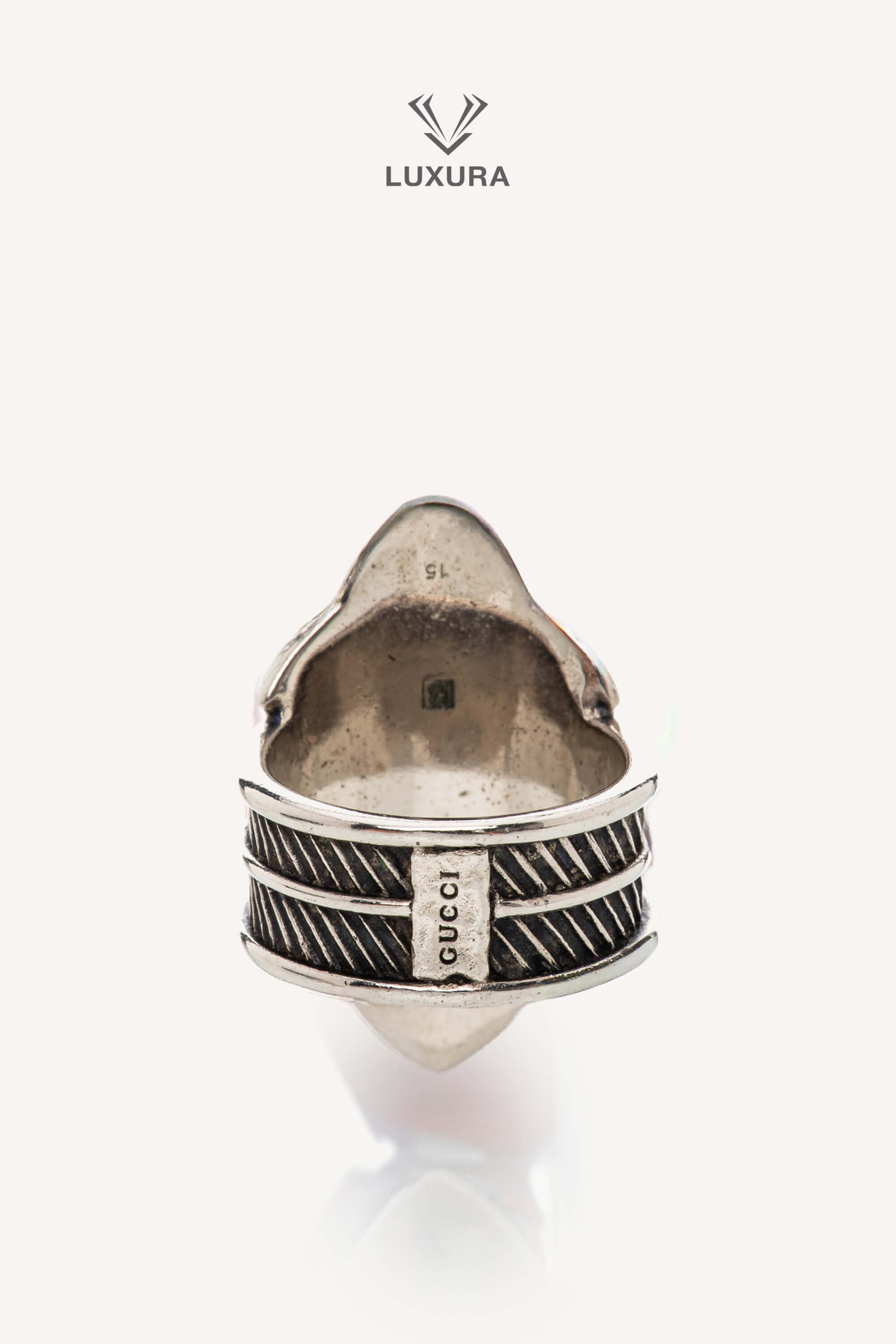 <span style="font-size: 10px;letter-spacing: .15em">BEST DEAL</span><br> <strong>GUCCI</strong><br> <div style="margin-top:10px;font-size:16px">Crystal Tiger Silver Ring</div><br> - Image 7